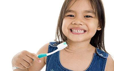 Young girl with a toothbrush
