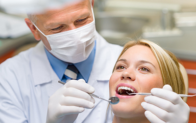 A woman having teeth cleaned
